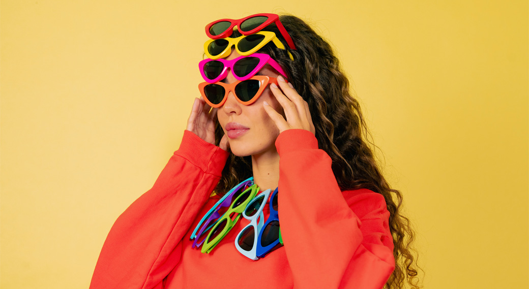 woman wearing colorful sunglasses